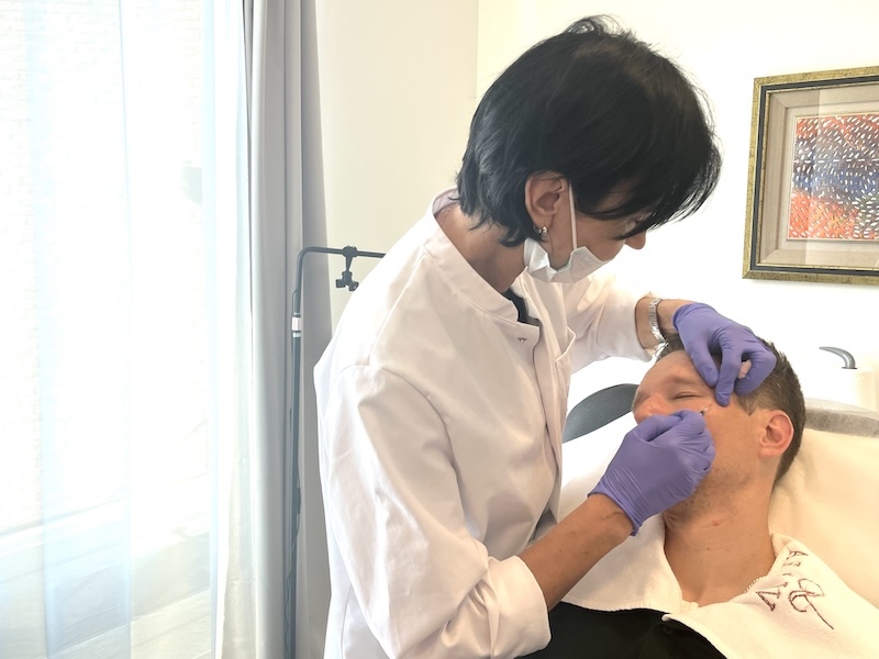 RN injector Botox Toronto RN Botox injector performing the treatment in Toronto